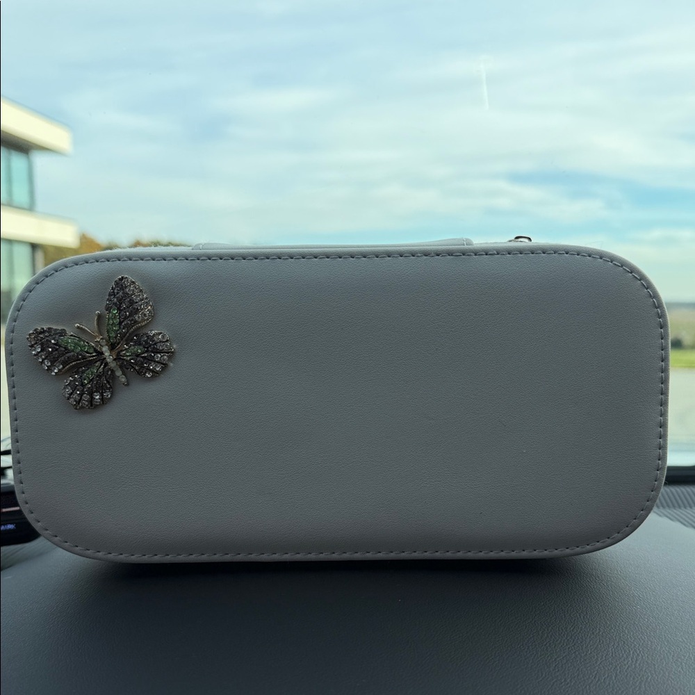 Elegant Gray Clutch with Butterfly Accent